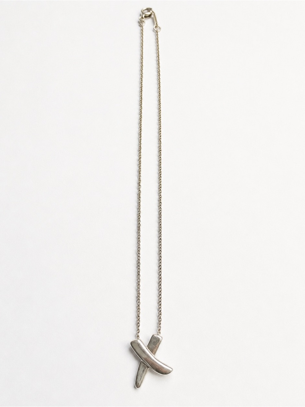 Tiffany and Co Sterling Silver X Kiss Necklace